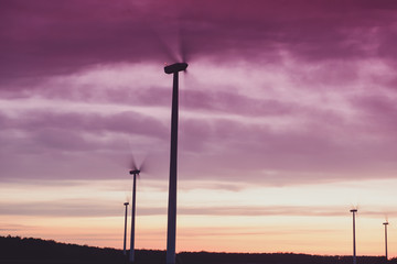 Fototapeta na wymiar Windturbines at sunset