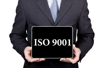 ISO 9001 written on virtual screen. technology, internet and networking concept. man in a business...
