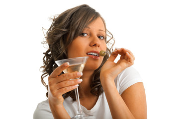 Young woman drinking martini isolated on white background. Waist