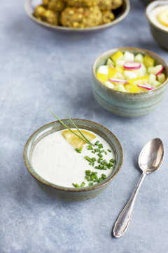 Charred Broccoli Falafel with Charred Lemon Tahini and Tzatziki