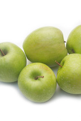 mele verdi su sfondo bianco