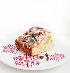 Apple pie with pine nuts and powdered sugar