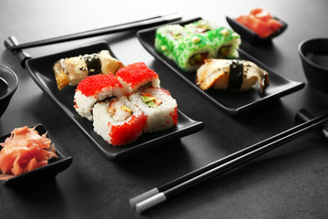 Delicious sushi set on ceramic plate