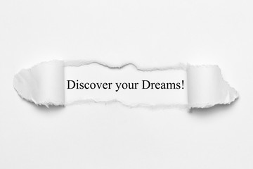 Discover your Dreams! on white torn paper