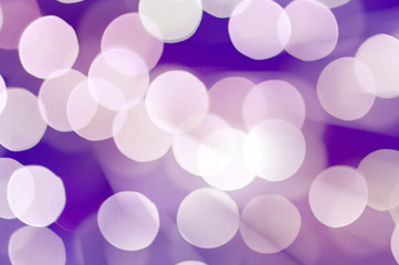 Abstract circle lights on a lilac background