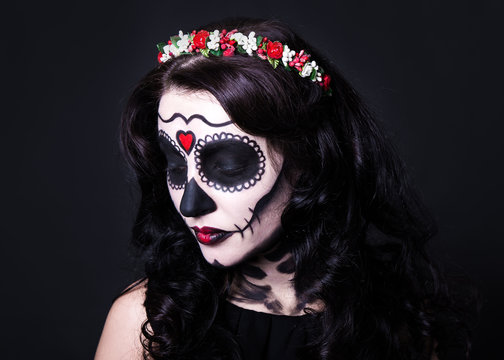 close up of young woman with skull make up