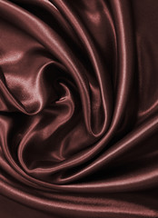 Smooth elegant dark brown chocolate silk as background