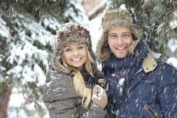 Winter portrait of happy loving couple