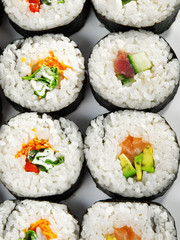 Maki sushi isolated on white background, shot from above