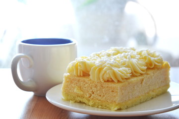 vanilla butter cake and coffee cup
