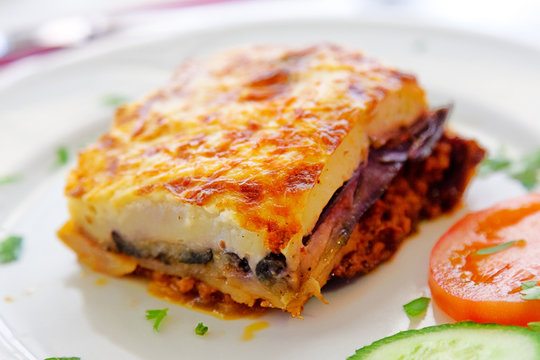 Greek style moussaka with eggplants, ground beef and potatoes. H
