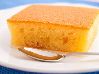 Sponge cake with sugar syrup. Vertical shot
