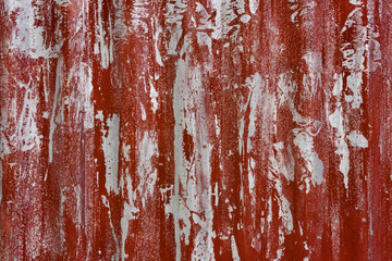 Red grungy corrugated sheet metal fence, Mandalay, Myanmar