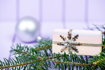 Christmas decoration on a purple striped background - selective