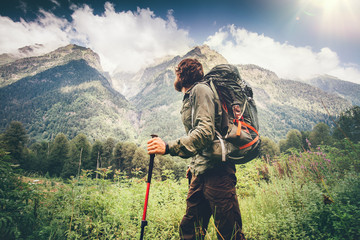 Man explorer with backpack hiking Travel Lifestyle concept beautiful mountains landscape on...