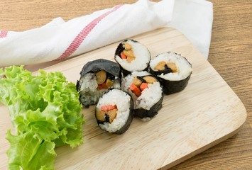 Veggie Sushi Rolls or Vegetable Maki on Wood Tray