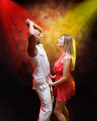 Young couple dances Caribbean Salsa