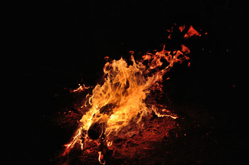 Night bonfire on the river