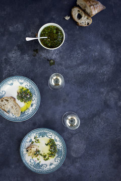 Italian Style Salsa Verde served with bread and white wine. Phot