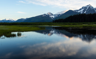 Naklejka na ściany i meble Alaskan mountains with lake