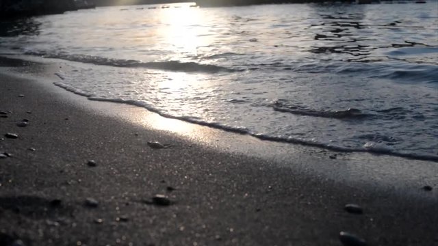 Sea surf at sunset in Montenegro