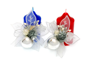 Two Christmas Candles isolated on a white