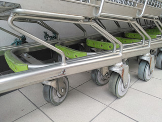 Fototapeta na wymiar cart several rows combine in shops supermarkets