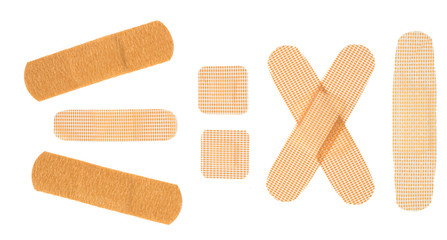 A set of medical plasters. On white, isolated background.