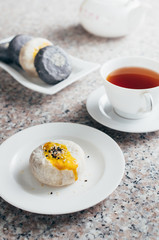 black and white moon cakes serve with chinese tea