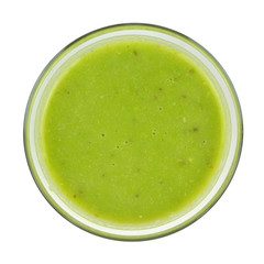 Fresh, just made, kiwi smoothie with greenery isolated on white - bird's-eye view