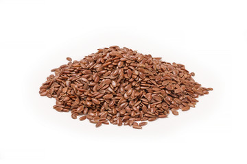 Close up of flax seeds isolated on white background