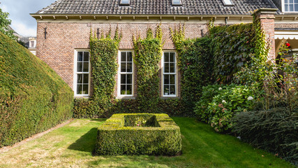 Formal French garden around castle Twickel in Delden the Netherl