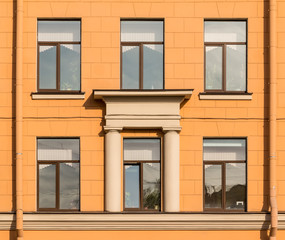 Fototapeta na wymiar Several windows in a row on facade of Secondary school №243, St. Petersburg, Russia.