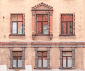 Several windows in a row on facade of St. Petersburg Medical Center front view, Russia.