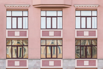 Fototapeta premium Several windows in a row on facade of Medical center 