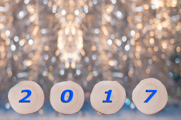 Four alder  saw cuts  and blue date 2017 on Christmas crumbling