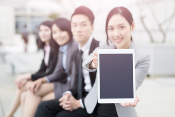 businesspeople show tablet to you