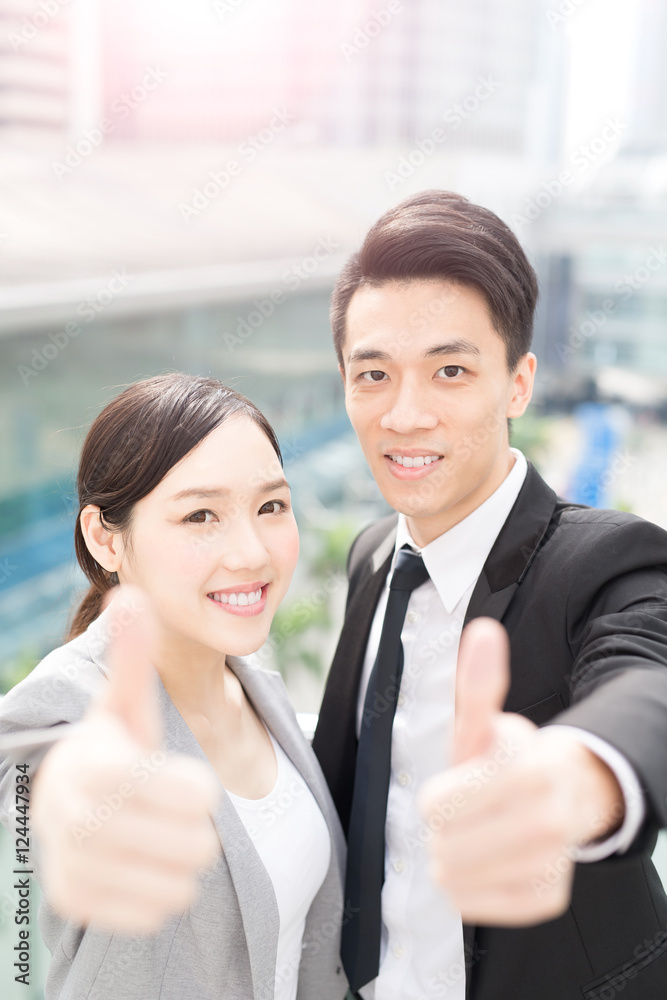 Poster businesspeople thumb up in office