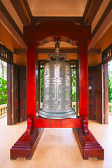 A big Buddhist bell cast in the image in the temple.