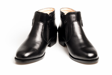 Black patent leather men shoes isolated on white background