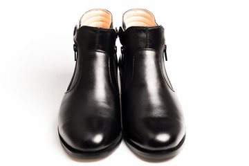 Black patent leather men shoes isolated on white background