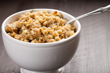 Stuffing in a white bowl on wood background