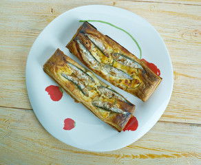 Pastry tart with anchovies