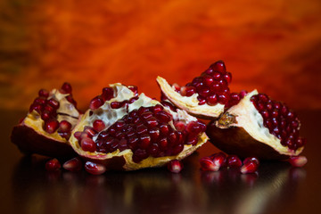 Ripe juicy fruit of the broken pomegranate