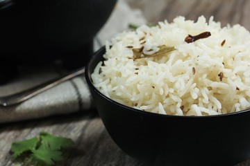Jeera Rice / Cumin Rice served in a black bowl