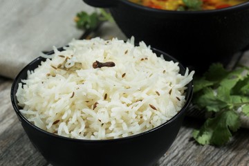 Jeera Rice / Cumin Rice served in a black bowl