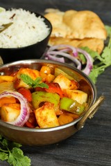 Kadai Paneer served with rice and Bhatura