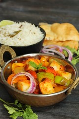 Kadai Paneer served with rice and Bhatura