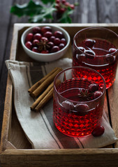 Mulled wine with cranberries, anise stars and cinnamon sticks