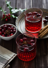 Mulled wine with cranberries, anise stars and cinnamon sticks